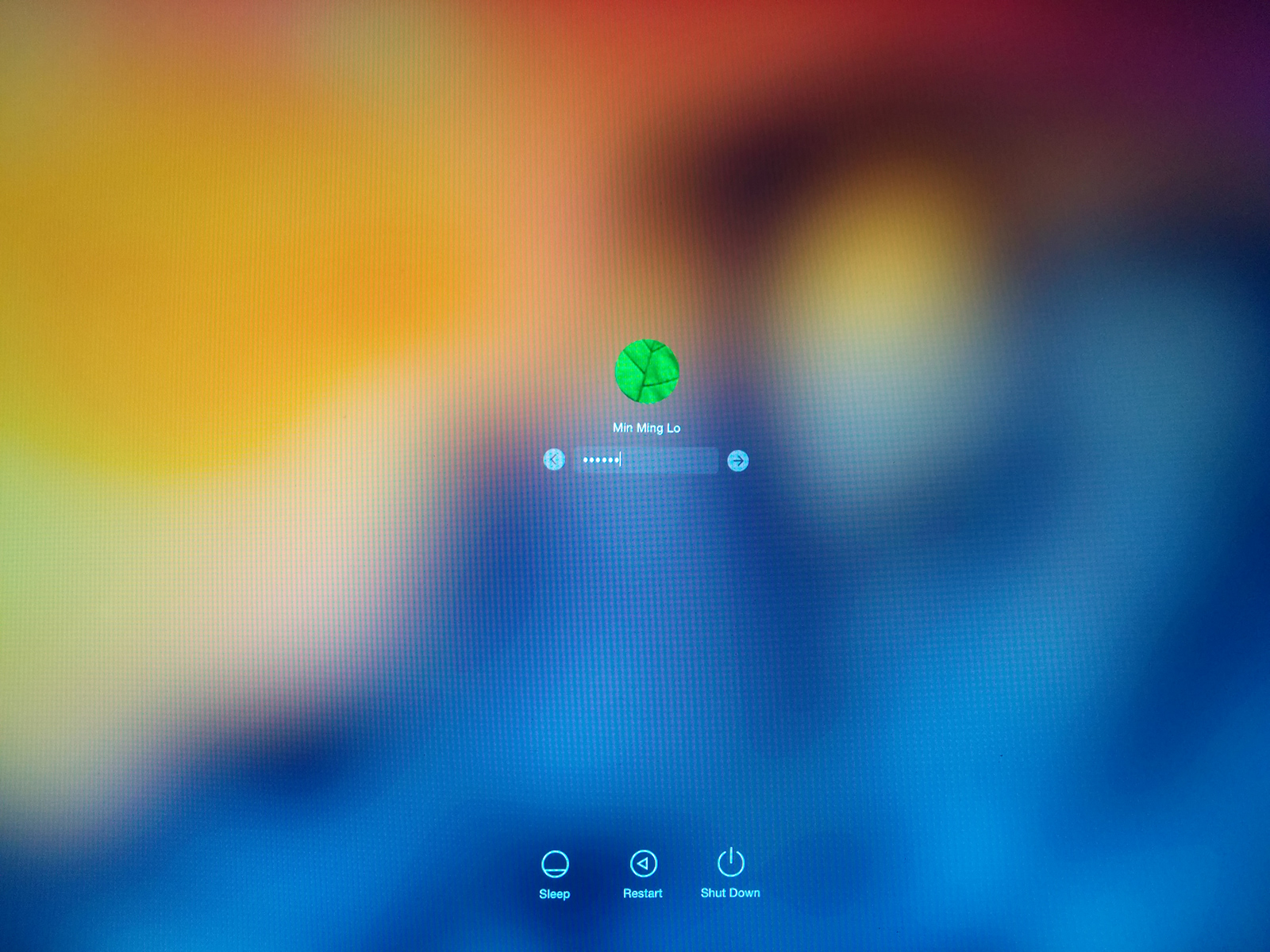 Mac OS X Yosemite's login screen is nicely done